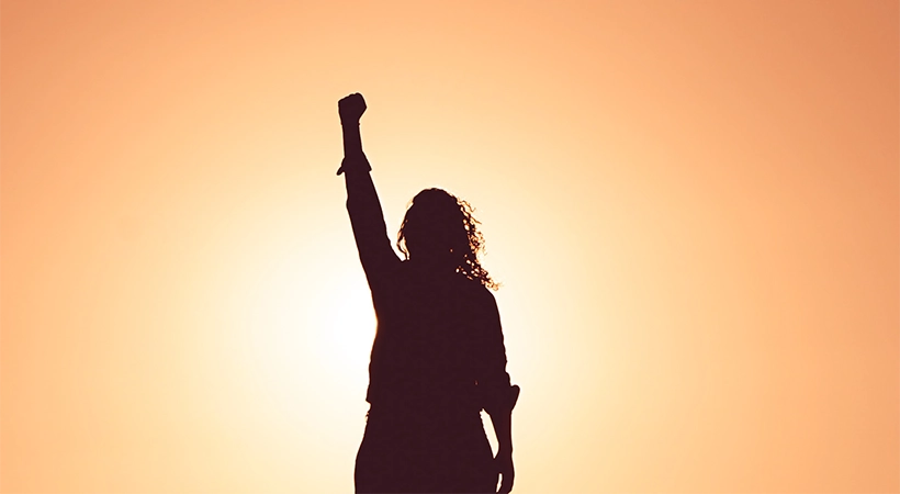 A photo illustration of a teenager celebrating the freedom found through Radically Open Dialectical Behavior Therapy (RO DBT) at Discovery Ranch South's Residential Treatment Program for Teenage Girls and Adolescents Assigned Female at Birth