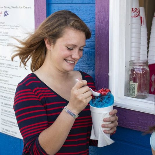A student eats a slushy during an outing at Discovery Ranch South, a teen residential treatment center for girls and youth assigned female at birth