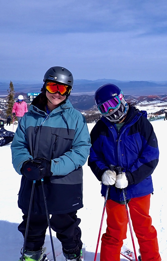 Students having a mastery experience and building self-efficacy while skiing as part of the adventure therapy program at Discovery Ranch South, a Residential Treatment Center for Girls and Teens Assigned Female At Birth