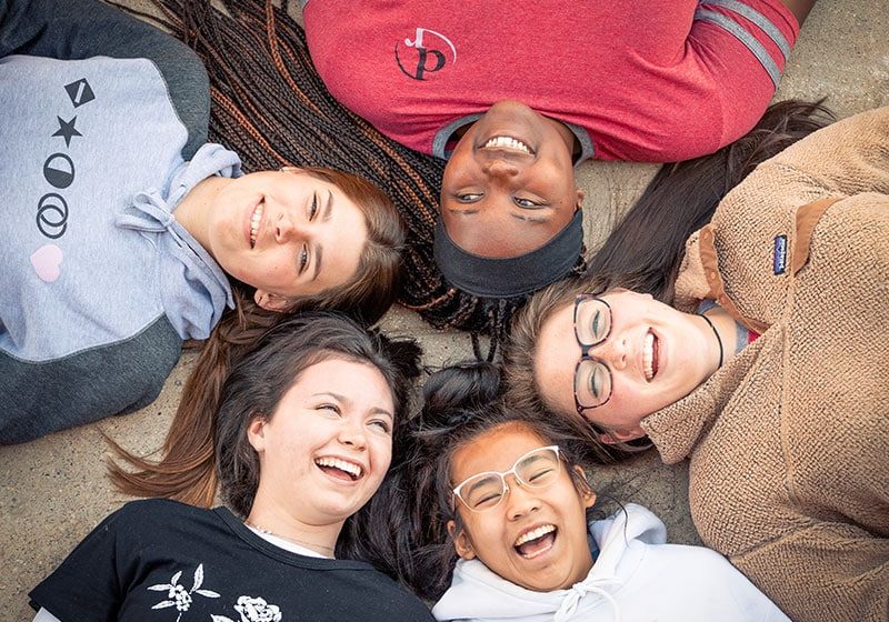 Girls having fun while in residential treatment for teenage anxiety | Discovery Ranch South - a residential treatment center for adolescent girls and teens assigned female at birth